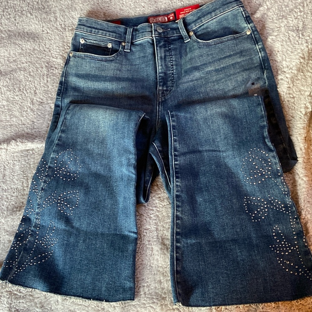 NWT Lucky Brand studded high rise Stevie flare. Studded floral on flare